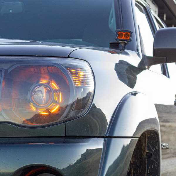 heretics ba-2 pod light being used as a ditch light on a tacoma